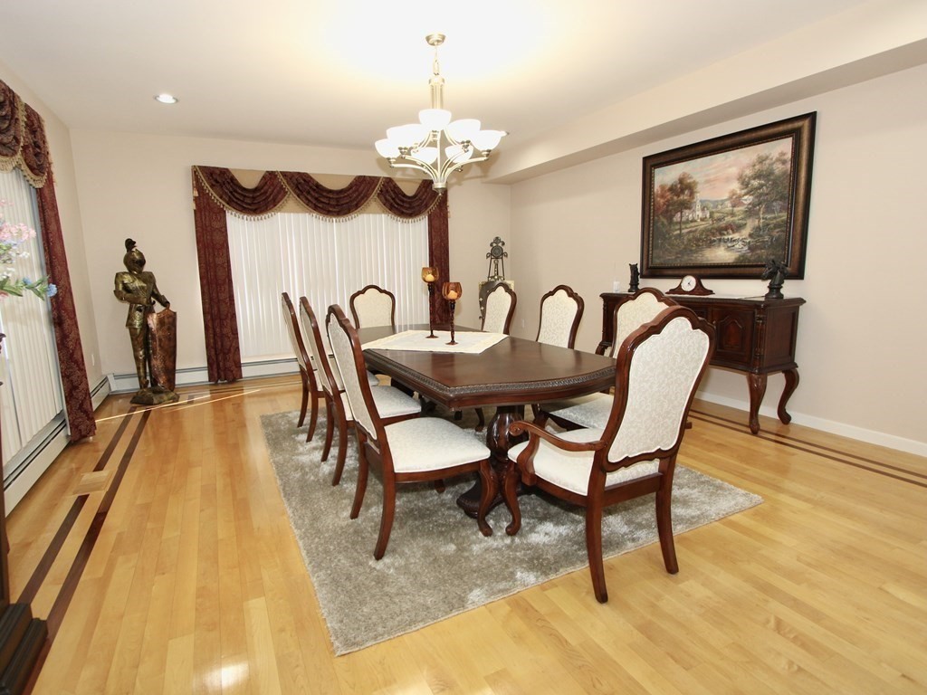 44 Whisper Drive Worcester, MA 01609 - Photo 5 of 40 a dining room with furniture and chandelier