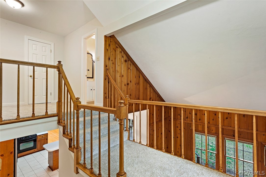 13105 Bluemont Road Chester, VA 23831 - Photo 17 of 29 a view of staircase with railing and white walls