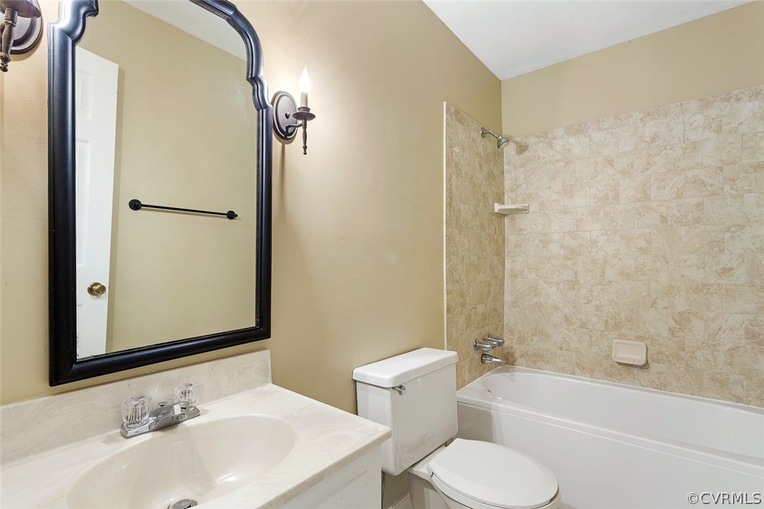 13105 Bluemont Road Chester, VA 23831 - Photo 26 of 29 a bathroom with a sink toilet and shower