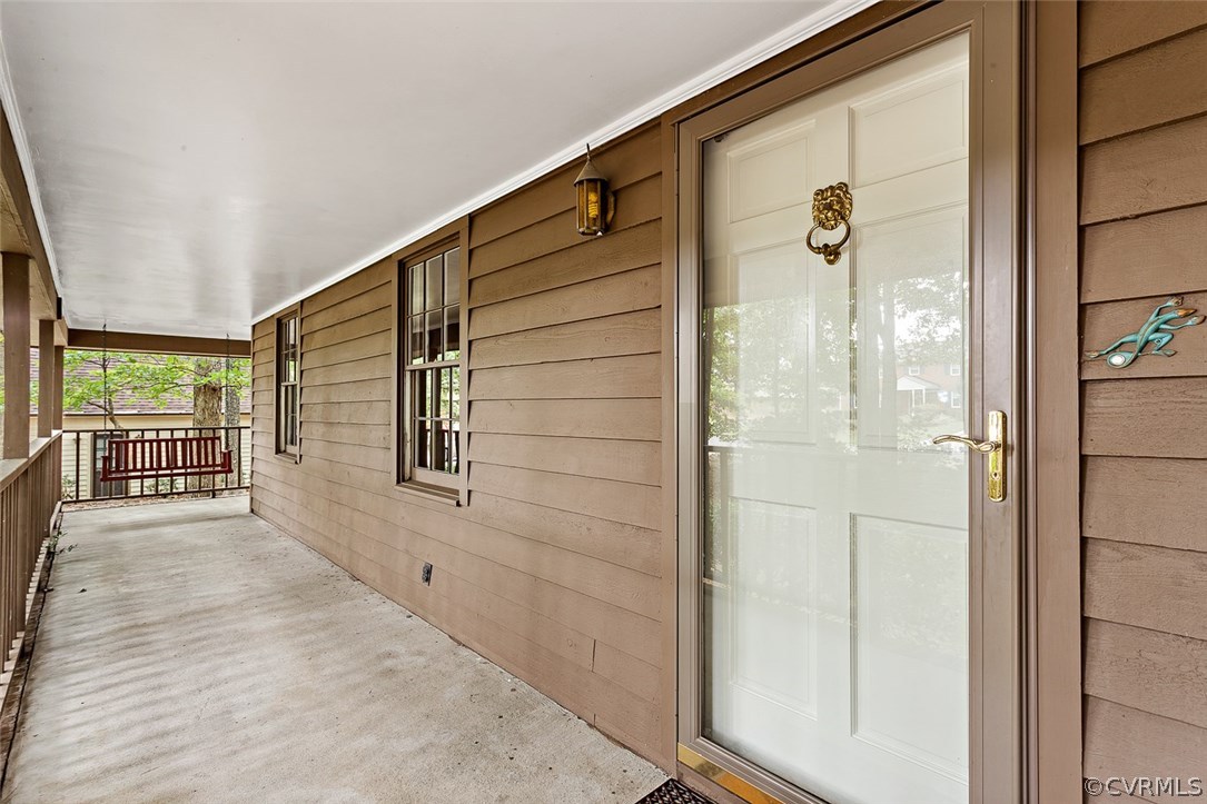 13105 Bluemont Road Chester, VA 23831 - Photo 3 of 29 a porch with sliding door and shower