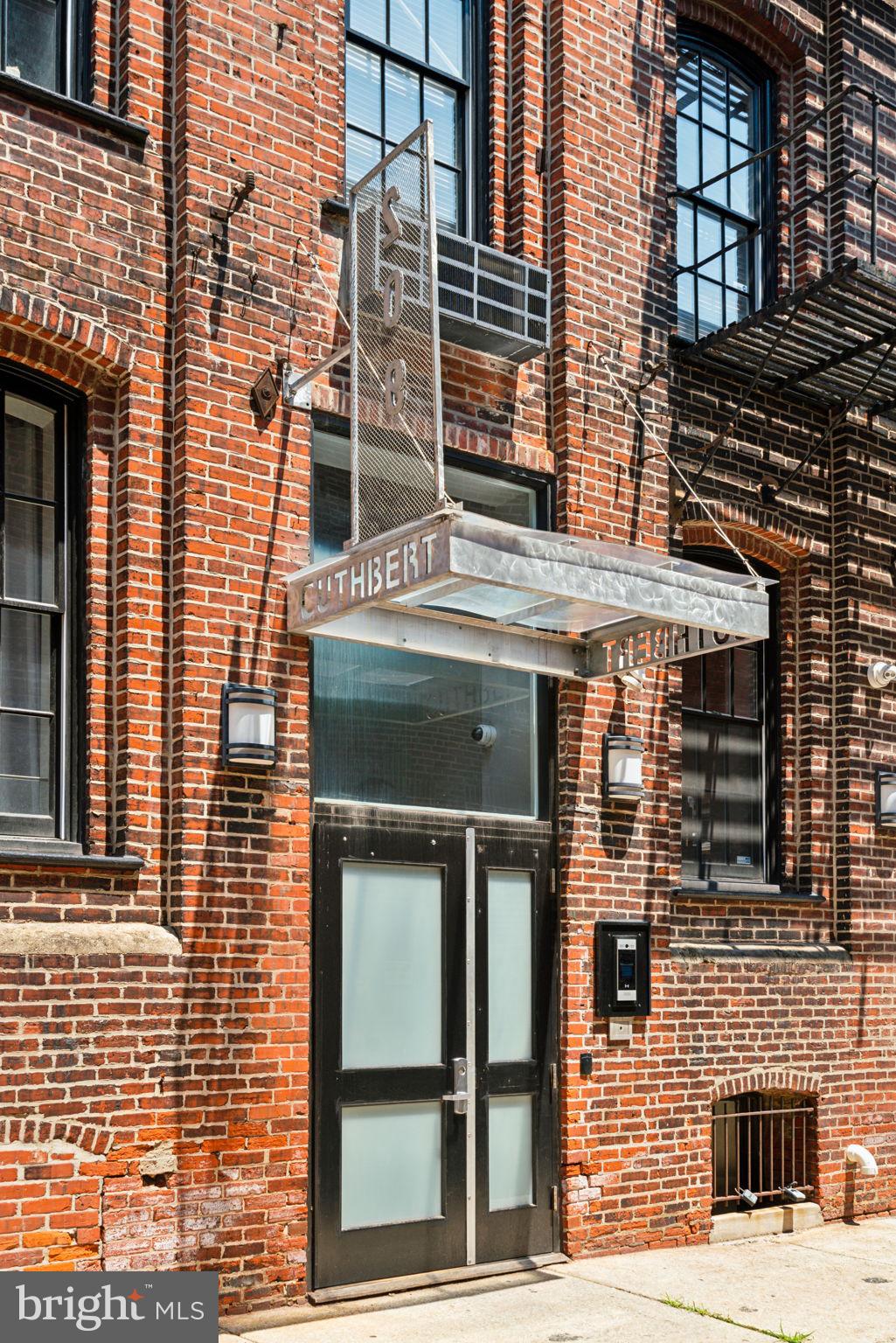 205 Cuthbert Street, Unit 301 Philadelphia, PA 19106 - Photo 24 of 25 a building view that has a sign on it