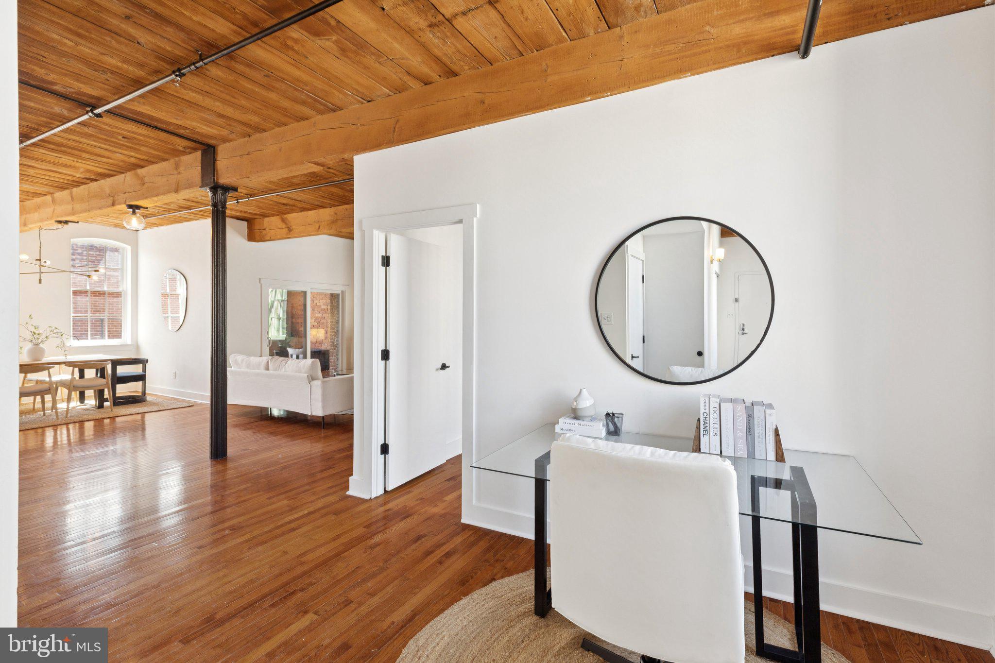 205 Cuthbert Street, Unit 301 Philadelphia, PA 19106 - Photo 6 of 25 a bathroom with a sink mirror and a shower