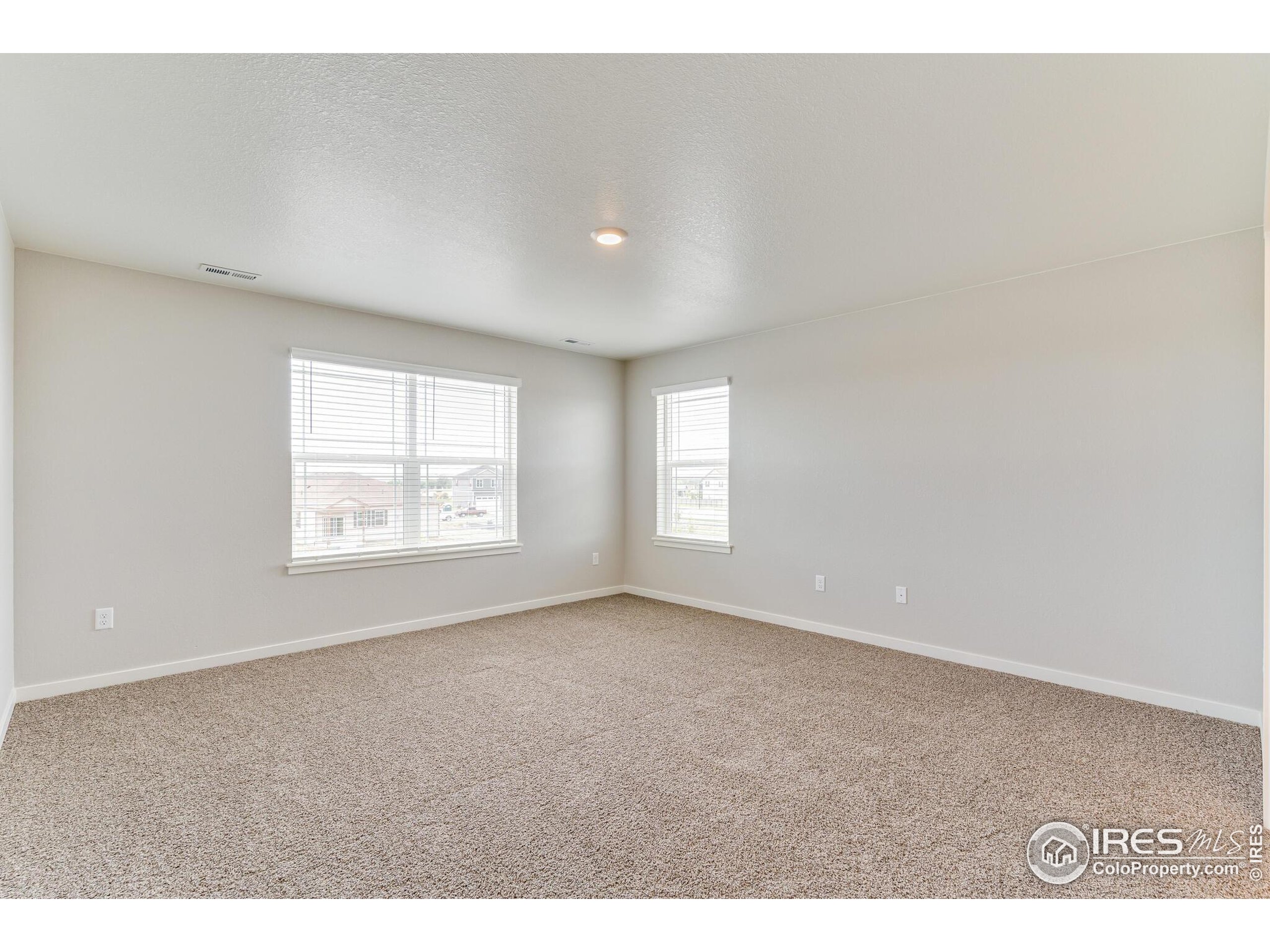 1894 Chaffee Crest Drive Berthoud, CO 80513 - Photo 15 of 31 a view of an empty room with a window