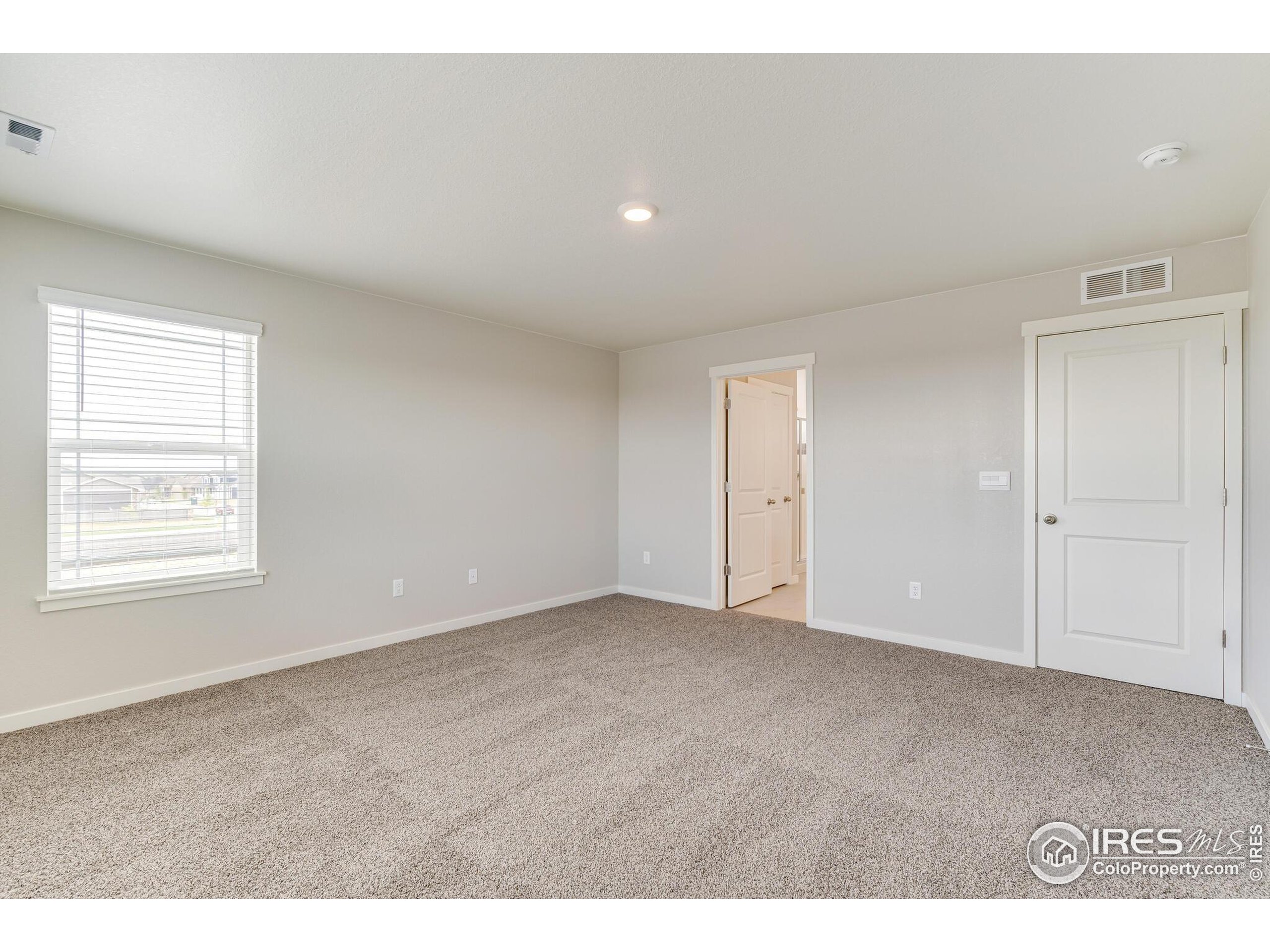 1894 Chaffee Crest Drive Berthoud, CO 80513 - Photo 16 of 31 a view of an empty room with a window