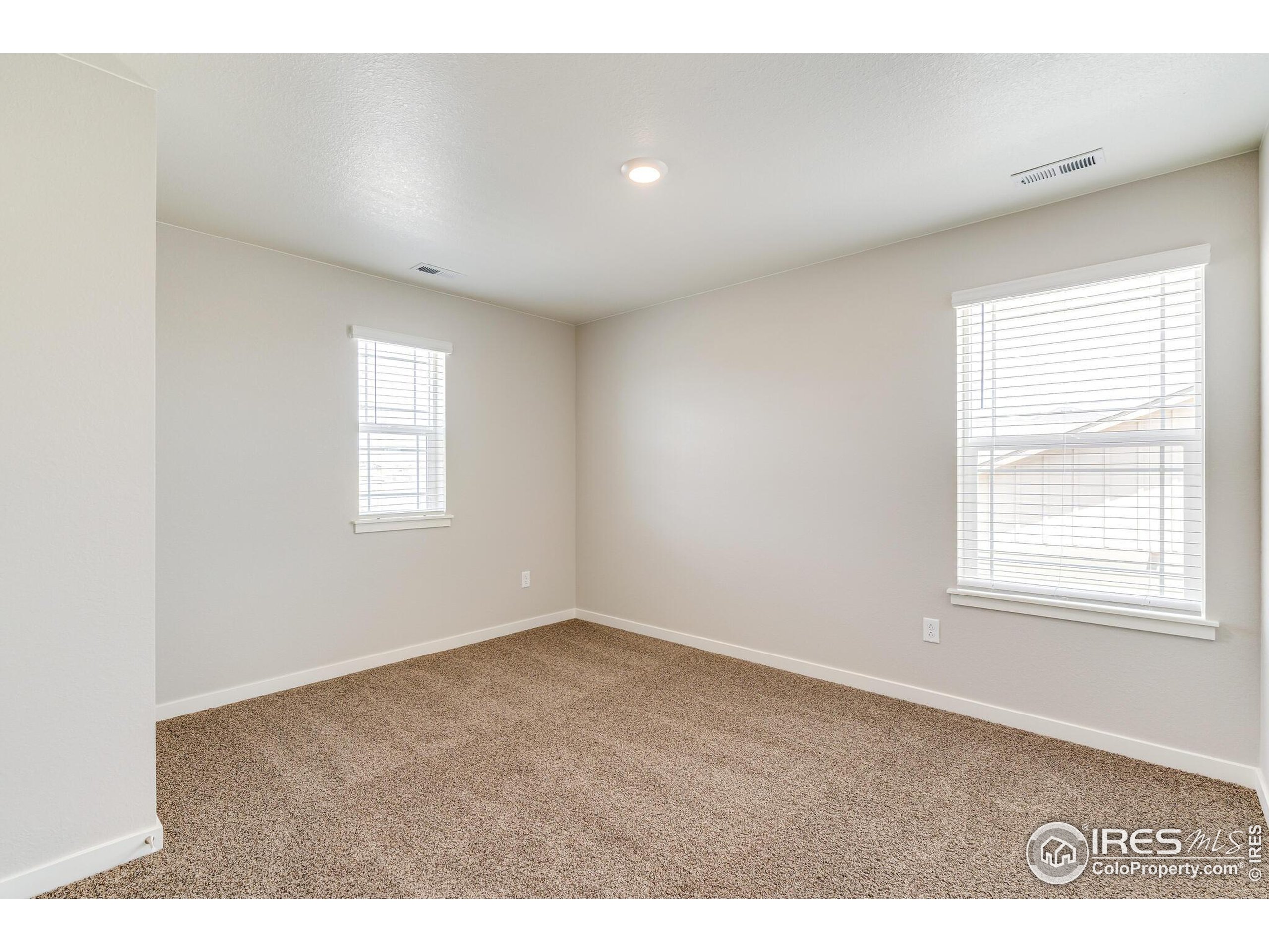 1894 Chaffee Crest Drive Berthoud, CO 80513 - Photo 23 of 31 a view of an empty room with a window