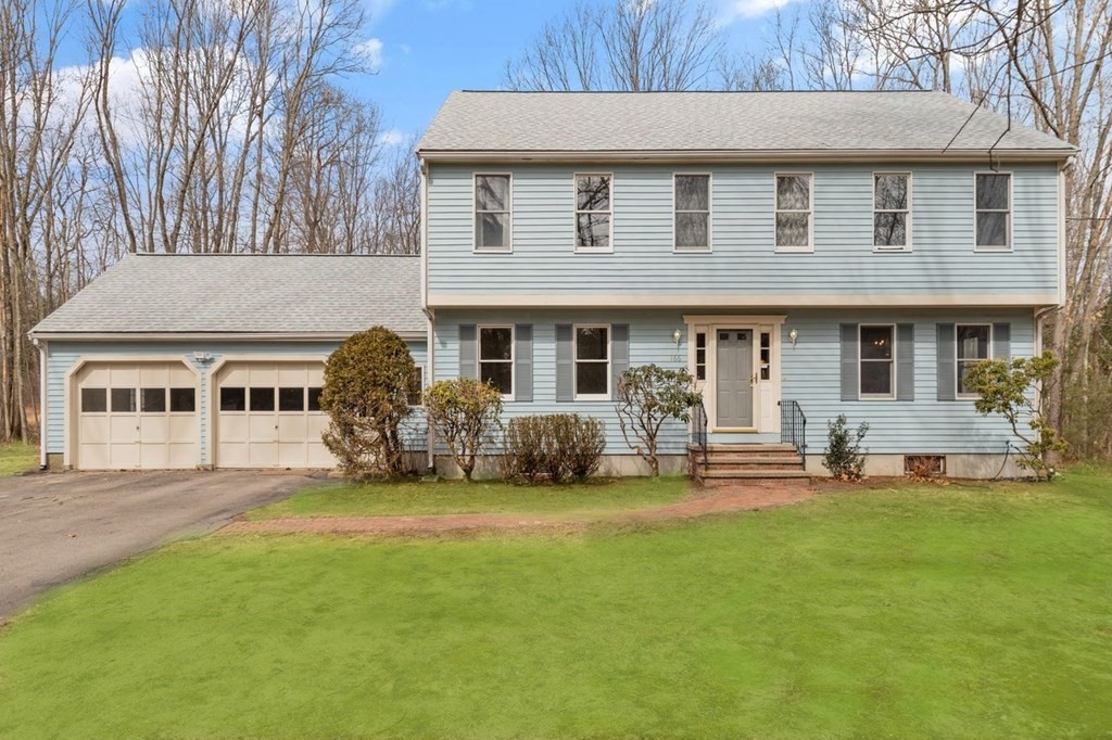 166 Edge Hill Road Sharon, MA 02067 - Photo 1 of 34 a front view of a house with a yard
