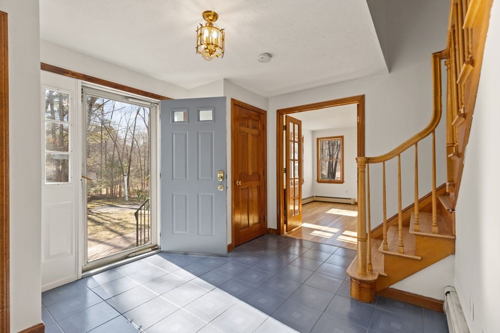166 Edge Hill Road Sharon, MA 02067 - Photo 2 of 34 a view of an entryway with wooden floor