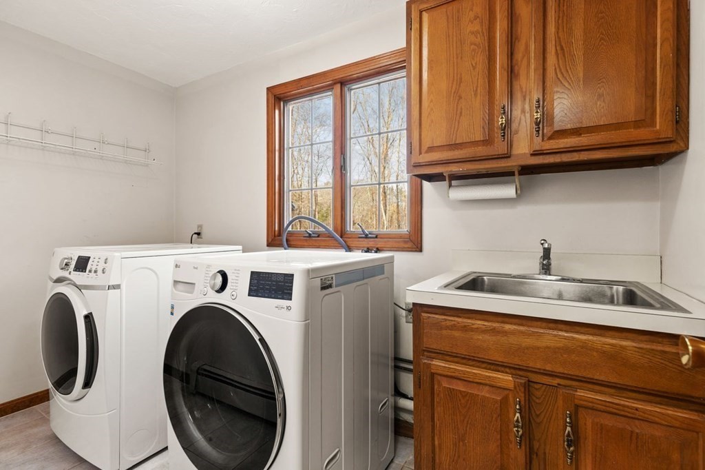 166 Edge Hill Road Sharon, MA 02067 - Photo 31 of 34 a utility room with dryer and washer