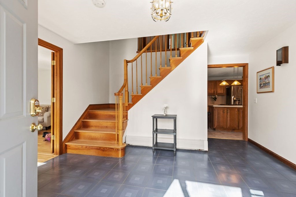 166 Edge Hill Road Sharon, MA 02067 - Photo 4 of 34 a view of entryway and hall with wooden floor