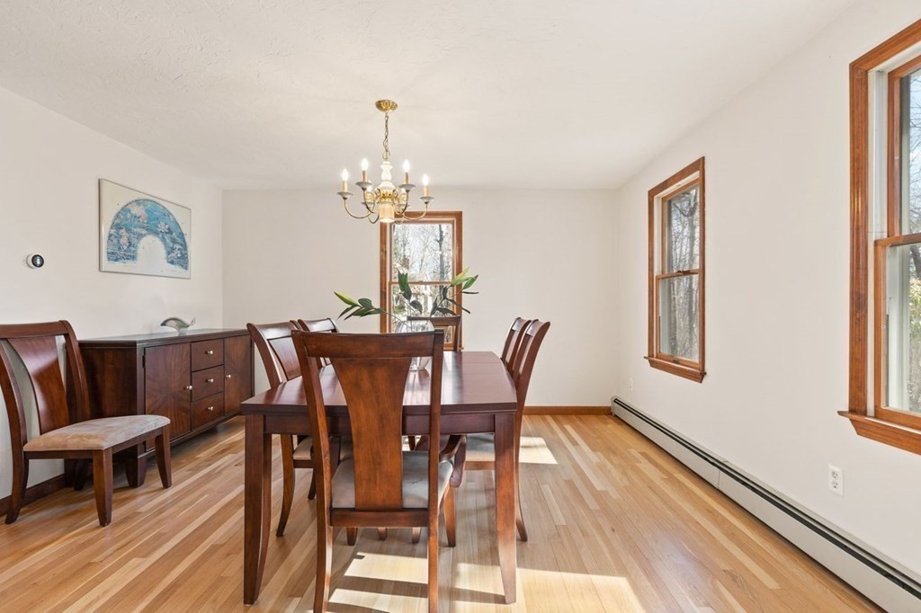 166 Edge Hill Road Sharon, MA 02067 - Photo 6 of 34 a view of a dining room with furniture window and wooden floor