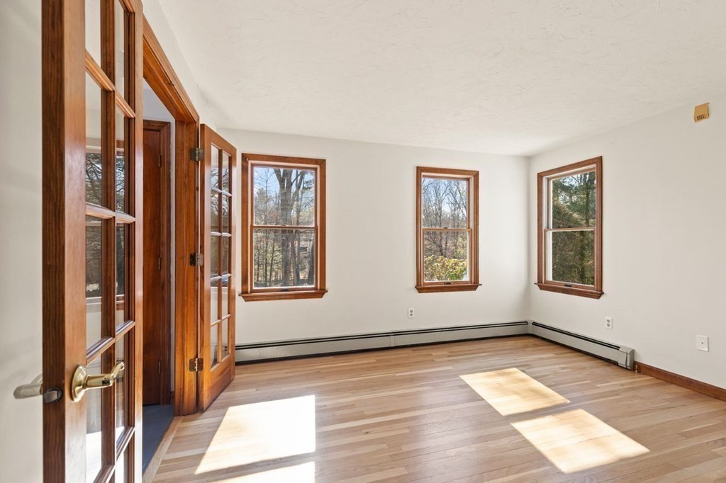 166 Edge Hill Road Sharon, MA 02067 - Photo 9 of 34 a view of an empty room with glass door