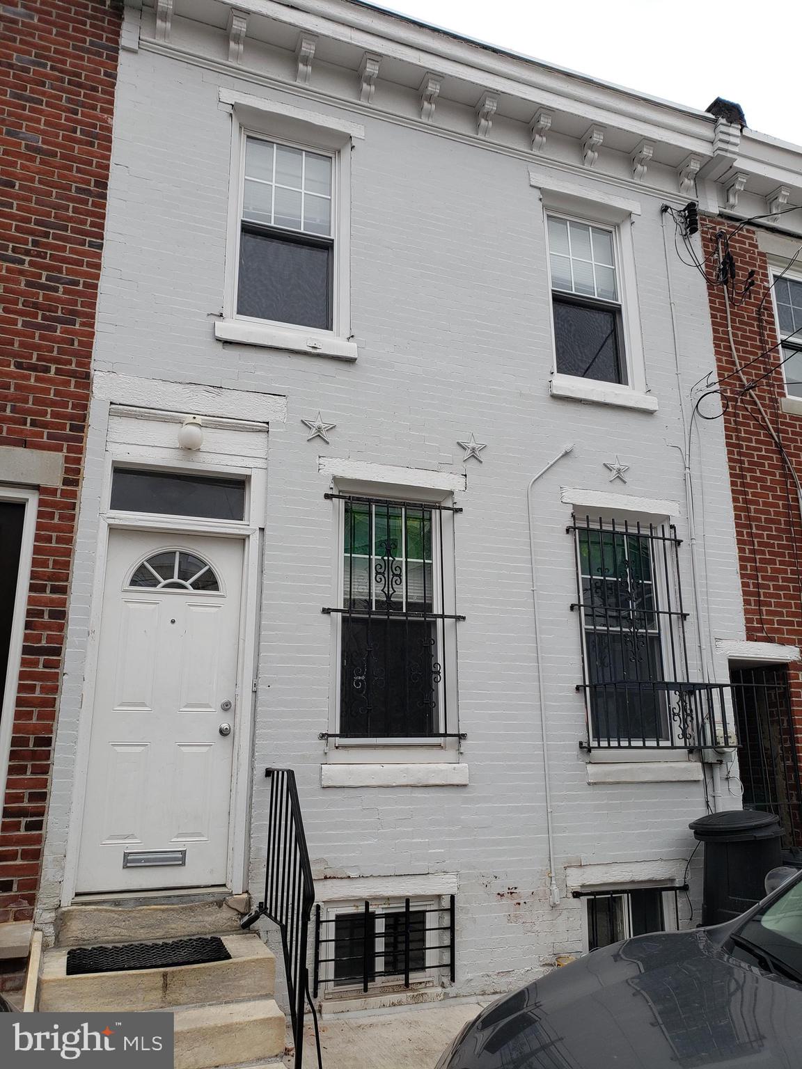 1623 Webster Street Philadelphia, PA 19146 - Photo 1 of 36 a living room with a fireplace and a flat screen tv