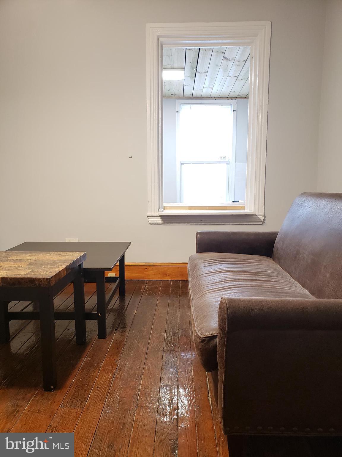 1623 Webster Street Philadelphia, PA 19146 - Photo 11 of 36 a living room with a couch and a table