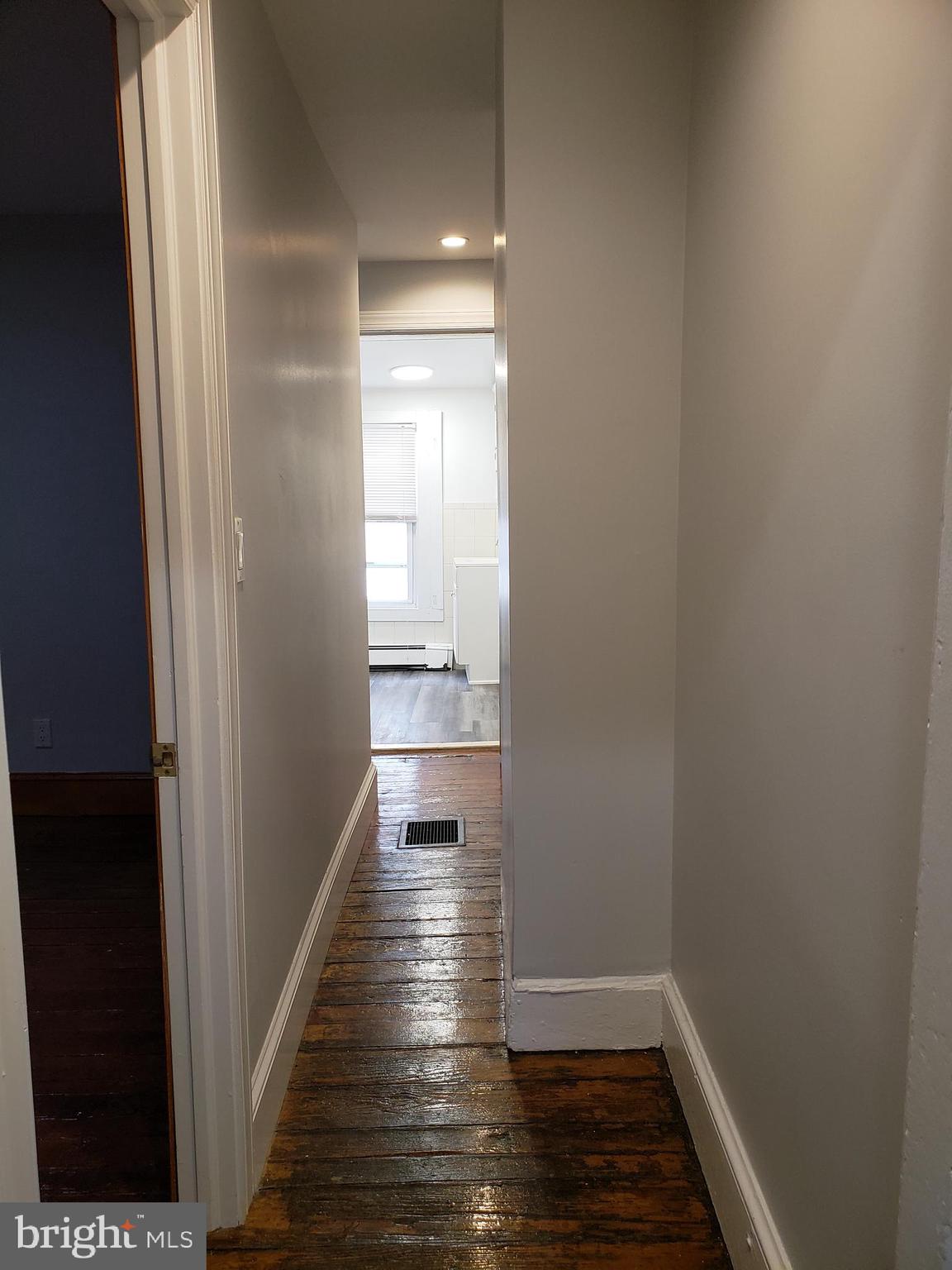 1623 Webster Street Philadelphia, PA 19146 - Photo 28 of 36 a view of a hallway with wooden floor