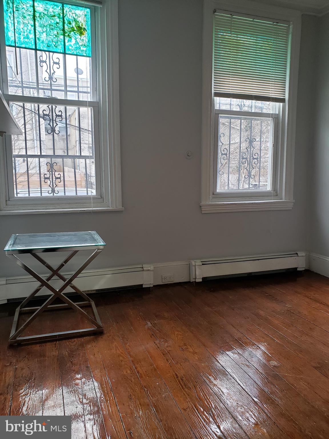 1623 Webster Street Philadelphia, PA 19146 - Photo 5 of 36 a view of a lounge chair in the livingroom