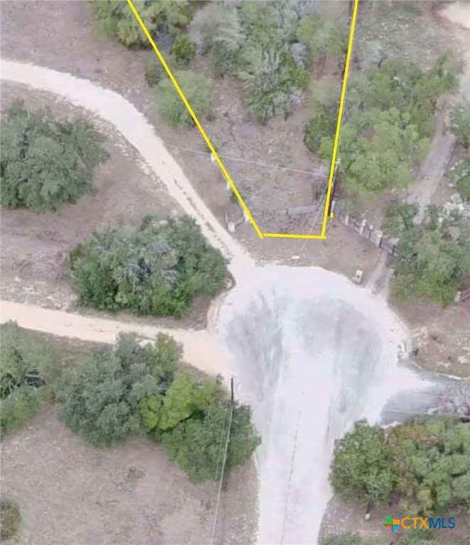 0 Arbor Trail Buda, TX 78610 - Photo 3 of 4 a view of a dry yard with large trees