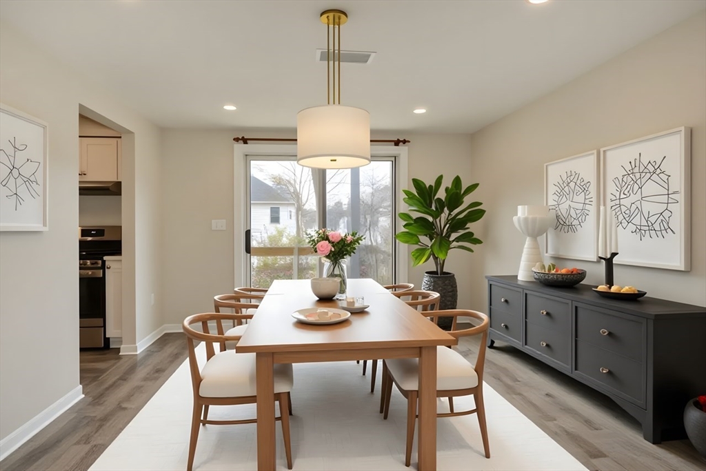 49 Douglas Avenue, Unit 49 Maynard, MA 01754 - Photo 3 of 23 a dining room with furniture and window