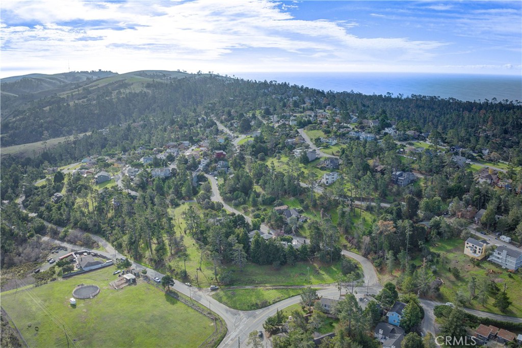 1981 Green Street Cambria, CA 93428 - Photo 11 of 16 a view of a lake with a mountain in the background