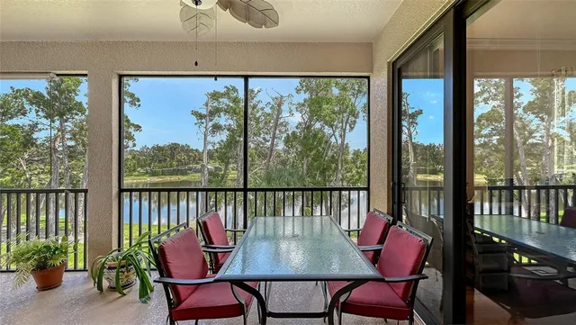 a view of a city from a dining room with furniture window and outside view