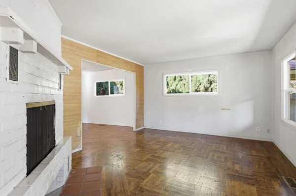 an empty room with windows
