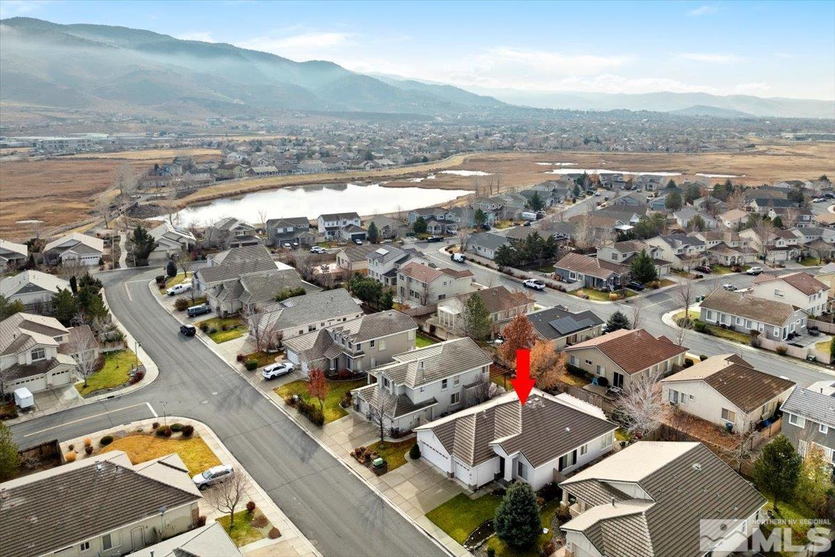 10055 Kentfield Place Reno, NV 89521 - Photo 38 of 39 an aerial view of residential houses with outdoor space