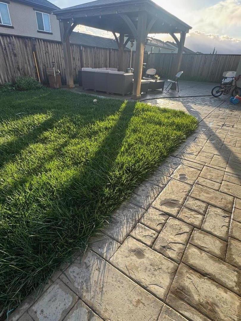 638 Robledo Drive Soledad, CA 93960 - Photo 7 of 7 a backyard of a house with table and chairs