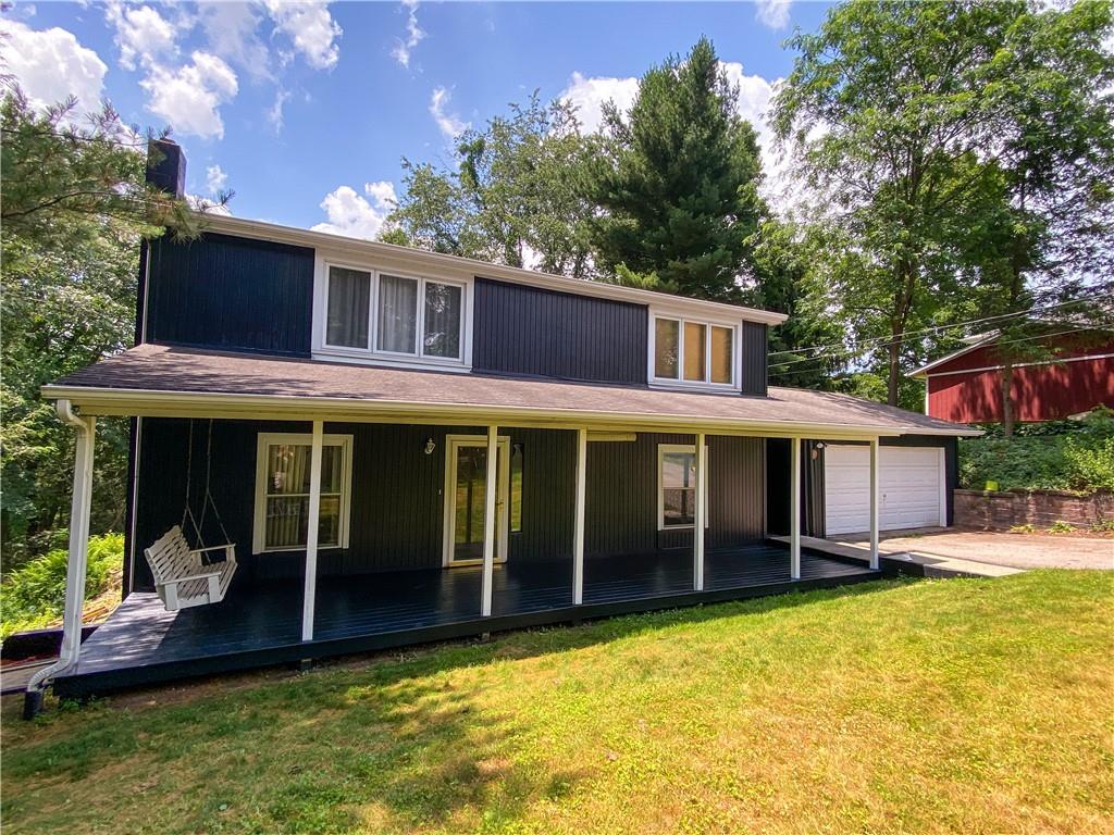 1310 Center Road Monaca, PA 15061 - Photo 2 of 32 Front porch with a swing