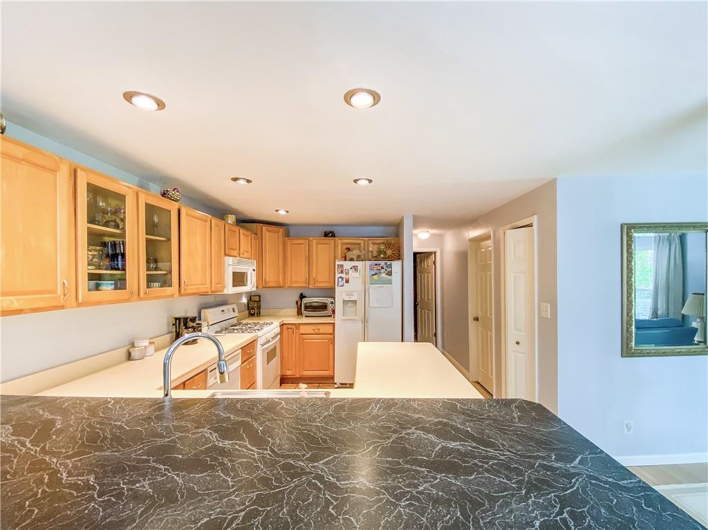 1310 Center Road Monaca, PA 15061 - Photo 21 of 32 Kitchen with a Breakfast Bar Countertop
