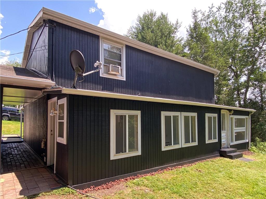 1310 Center Road Monaca, PA 15061 - Photo 5 of 32 Back of the house with breezeway on left
