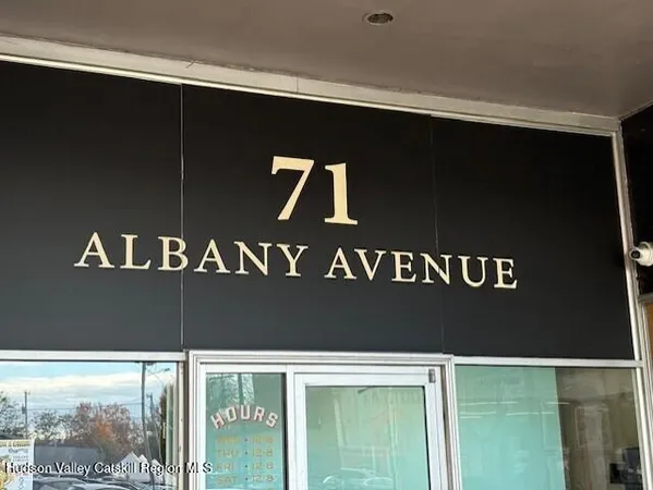 a black and white photo of a street sign