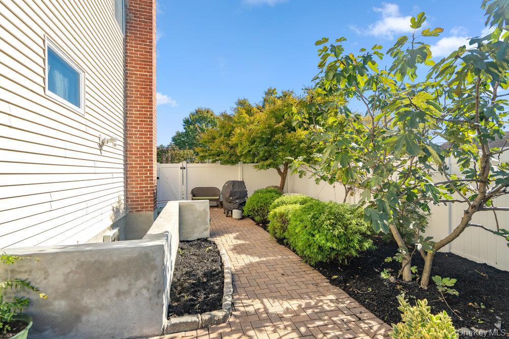 91 15th Avenue West Babylon, NY 11704 - Photo 28 of 33 a front view of a house with a yard