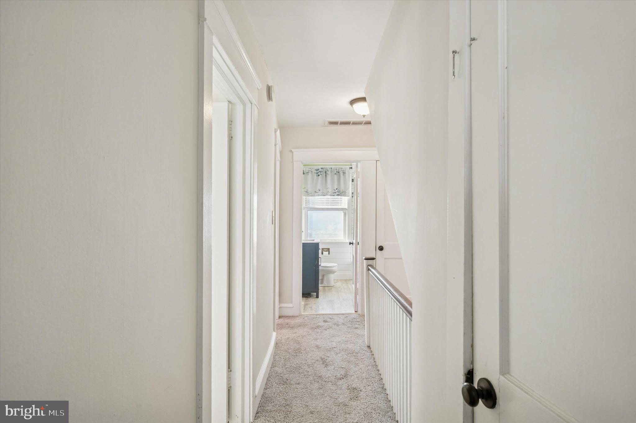 220 Sedgewood Road Springfield, PA 19064 - Photo 17 of 27 a view of a hallway with a white walls