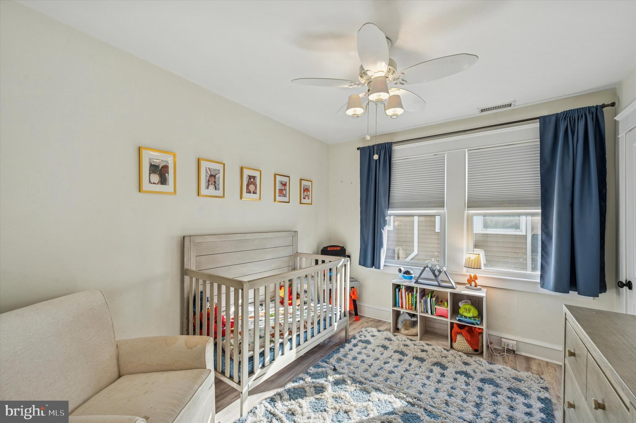 220 Sedgewood Road Springfield, PA 19064 - Photo 20 of 27 a bedroom with furniture and baby crib