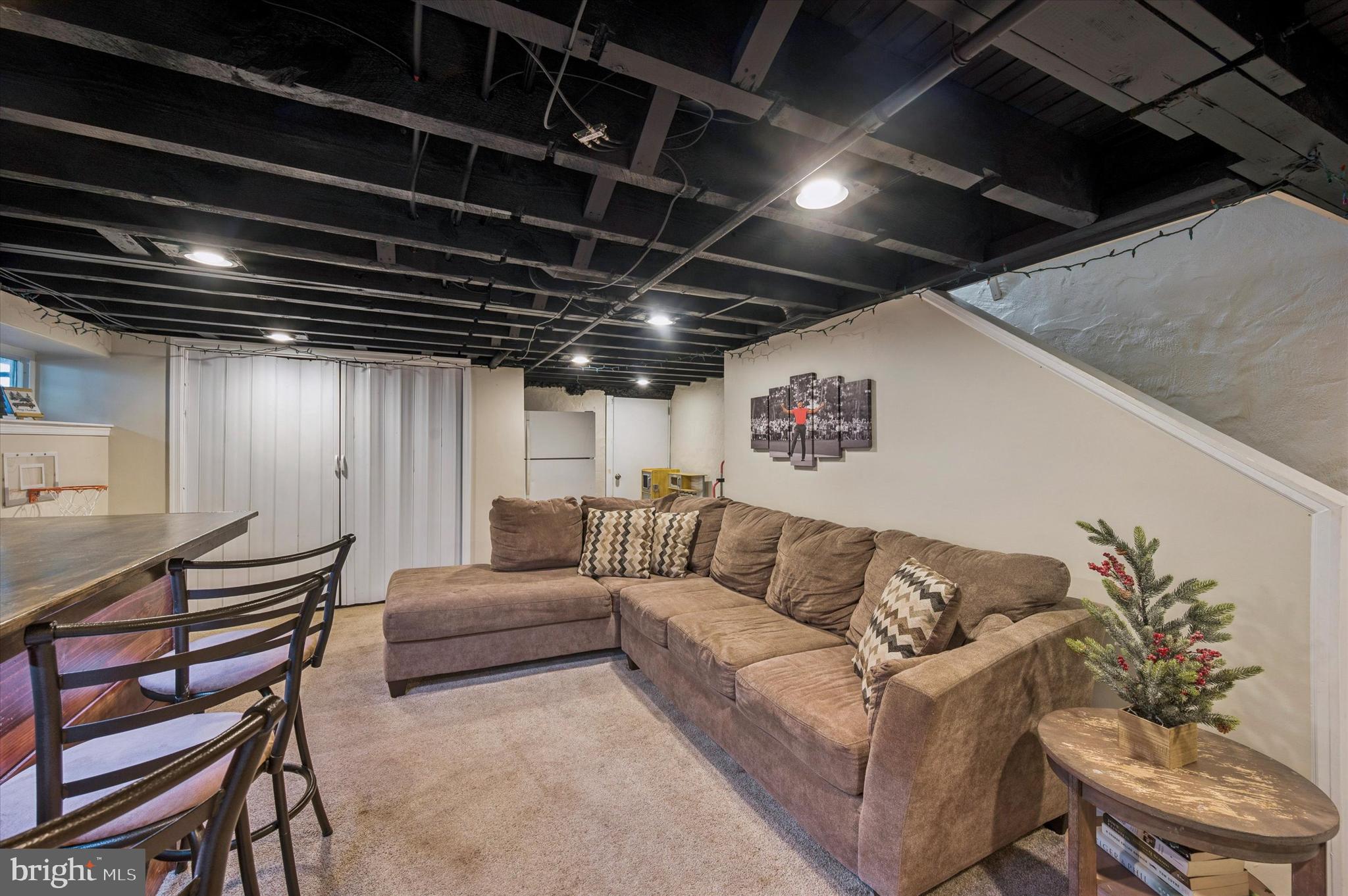 220 Sedgewood Road Springfield, PA 19064 - Photo 22 of 27 a roof with a couch and a potted plant