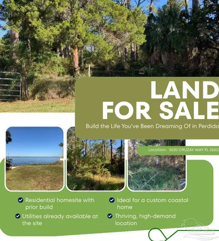 a view of outdoor space with a garden and signage