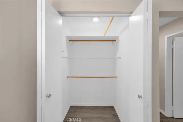 a bathroom with a sink toilet and a mirror