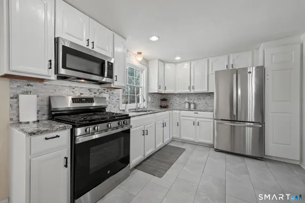 $425,000 | 18 Crestwood Trail, East Hartford, CT 06118