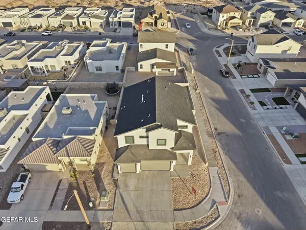 an aerial view of a multi story residential apartment building