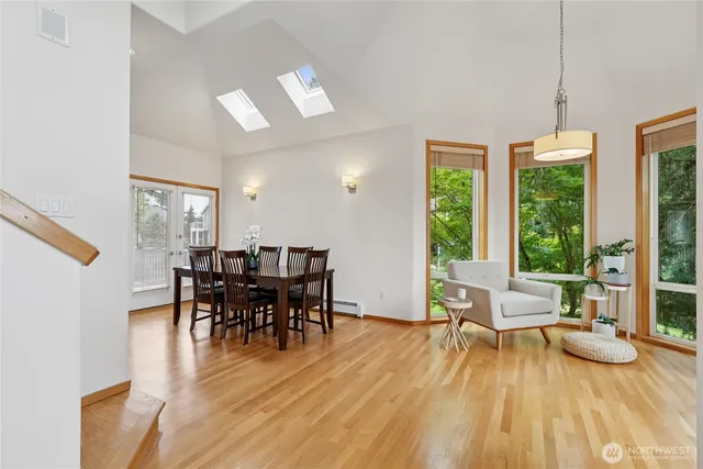 a view of a dining room with furniture window and outside view