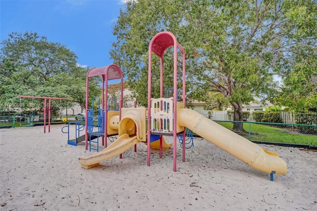 a view of a park with slide
