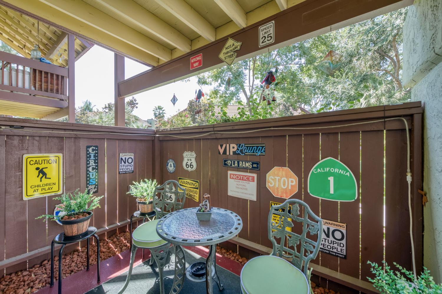 2909 Huntington Boulevard, Unit 145 Fresno, CA 93721 - Photo 16 of 33 a view of a chairs and table in the patio