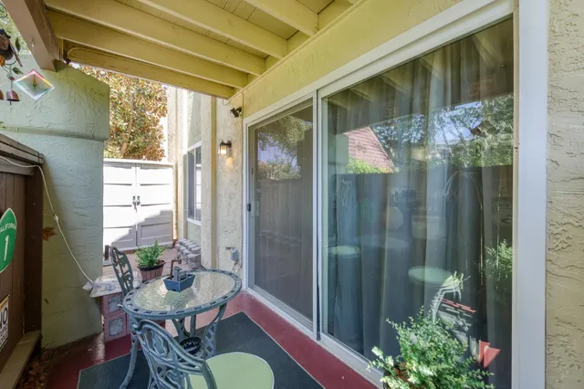 a outdoor dining space with furniture