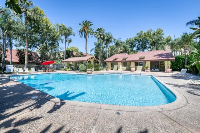 a view of a backyard with a patio