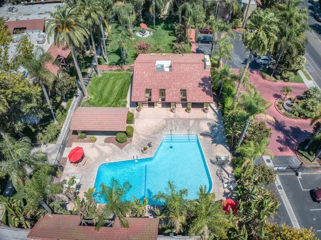 an aerial view of a house with a garden