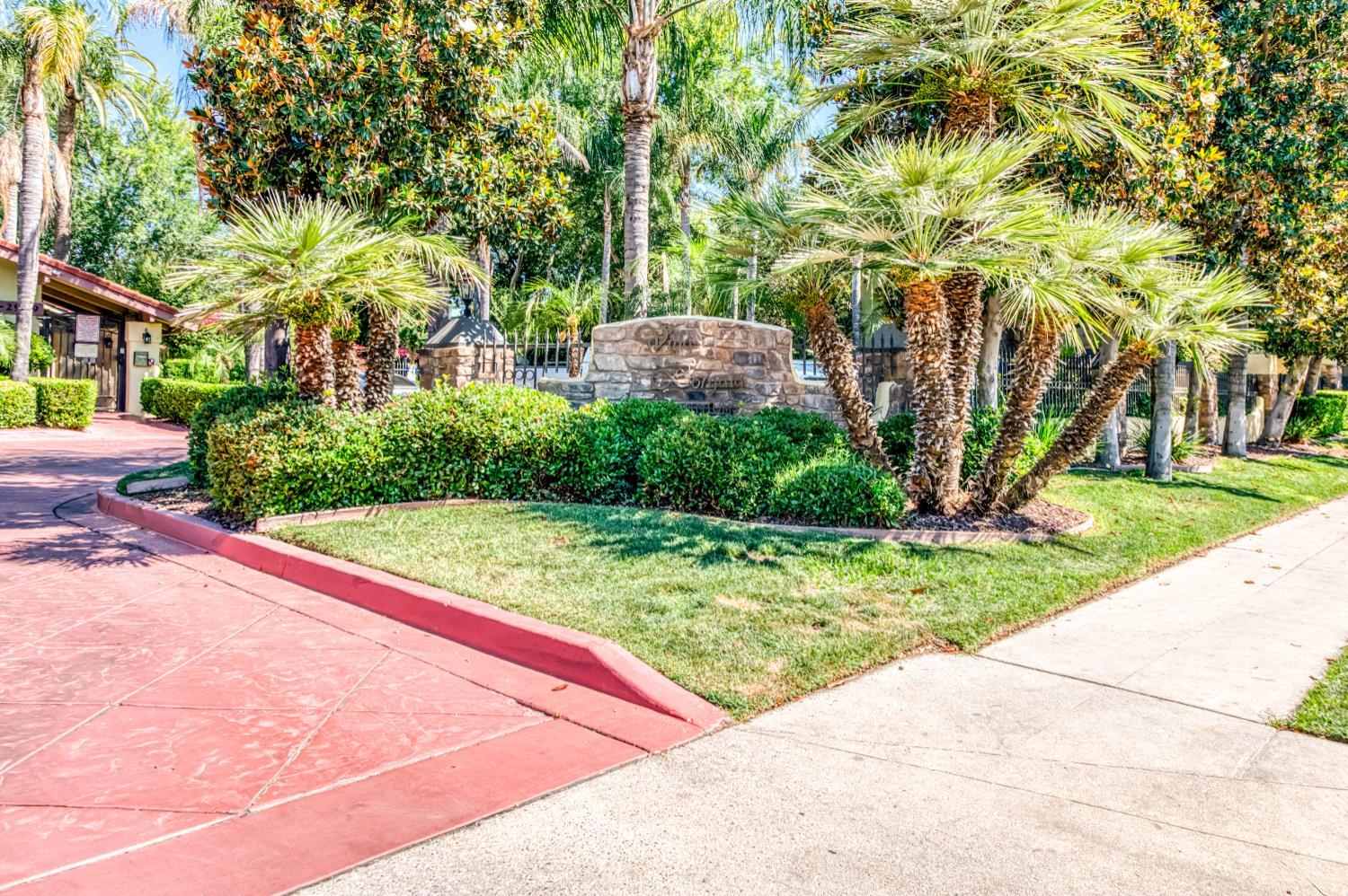 2909 Huntington Boulevard, Unit 145 Fresno, CA 93721 - Photo 28 of 33 a park view with large trees