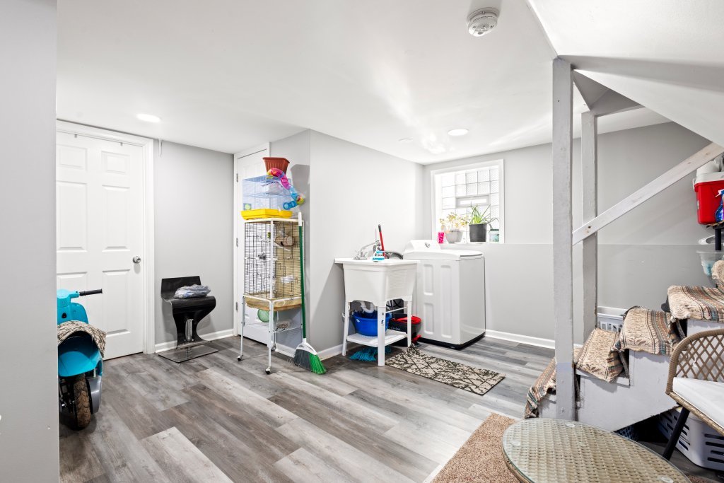 14564 Spaulding Avenue Harvey, IL 60426 - Photo 18 of 20 a living room with furniture and a wooden floor