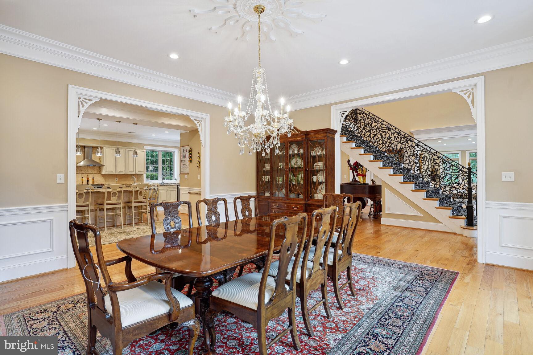 10813 Lockland Road Potomac, MD 20854 - Photo 16 of 73 a view of a dining room with furniture window and wooden floor