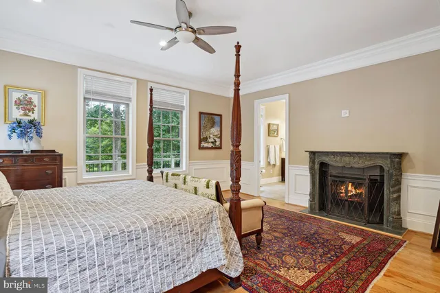 a spacious bathroom with a granite countertop tub and a sink