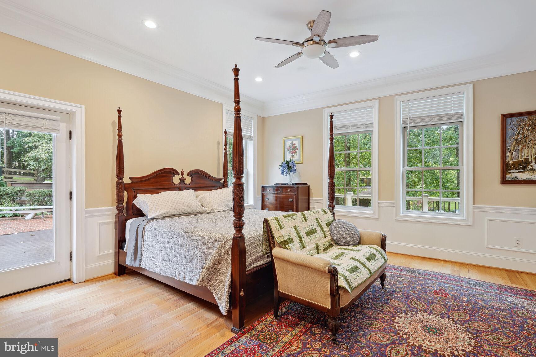 10813 Lockland Road Potomac, MD 20854 - Photo 30 of 73 a bedroom with a bed couch and window