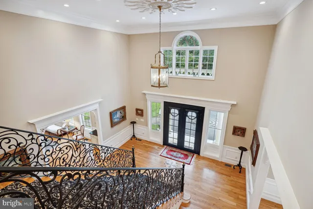 a living room with furniture and a stairs